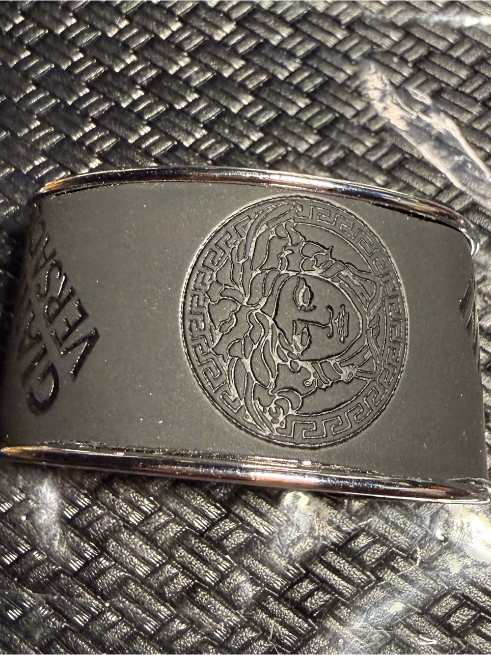 Medusa Bracelet with Black and Silver rolled edges design for his or her wrist.